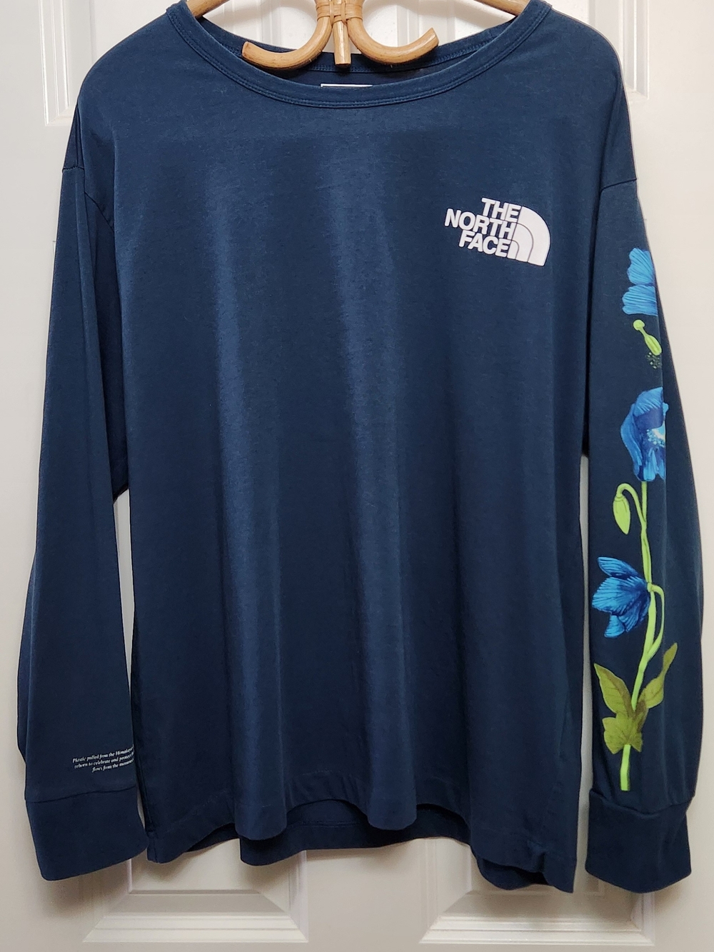 The North Face Navy/Teal, Long Sleeve Tee with Floral Sleeve Print.  XL.